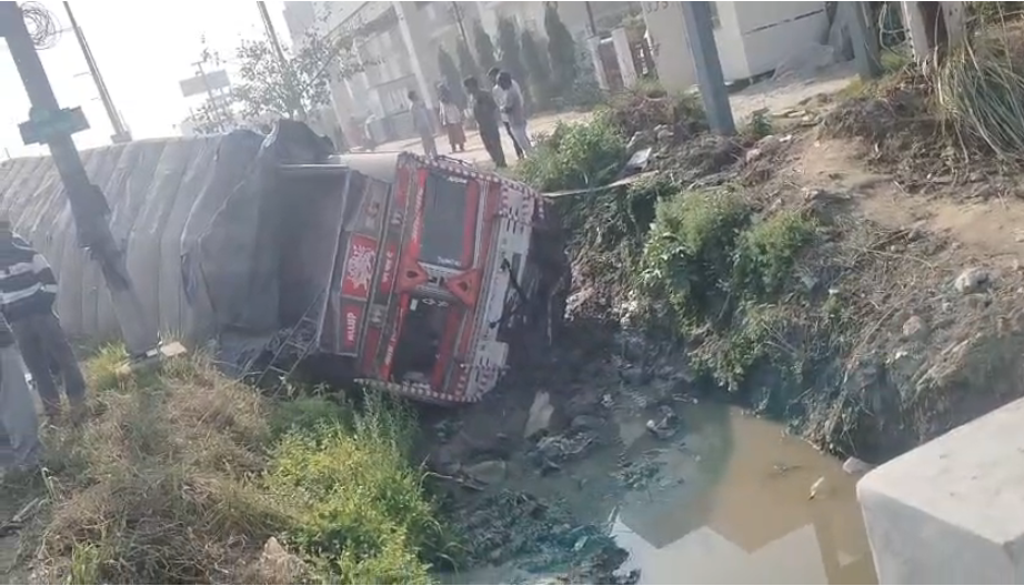 truck falls into drain